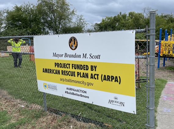 Sign at Indiana Ave Playground saying project funded by American Rescue Plan Act
