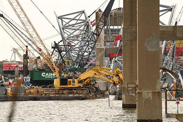 Salvage crews from the Key Bridge Response Unified Command remove wreckage from the collapsed bridge in Baltimore, Maryland, April 8, 202
