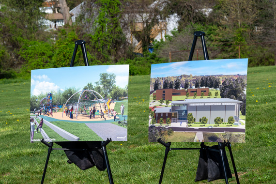 Easels with artistic representations of the future rec center