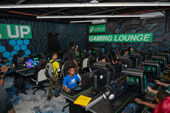 Interior of the gaming lounce showing people at PCs