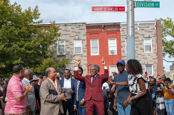 André De Shields with Mayor Brandon M. Scott and other people on the newly renamed André De Shields Way