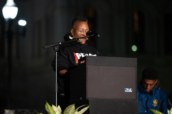 Person speaking at podium during event