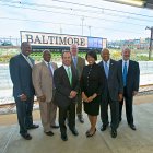 IMAGE: Mayor Rawlings-Blake and a number of City and State officials unveil a new welcome sign at Penn Station