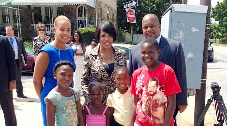 Mayor Rawlings-Blake and school children pose with a Safe Route to School footprint